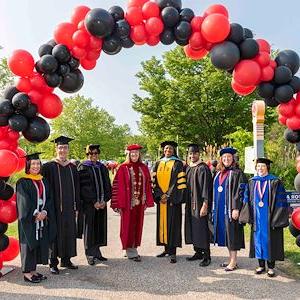 The Senior Leardership and Cabinet in graduation gowns during the 2023 commencement ceremony